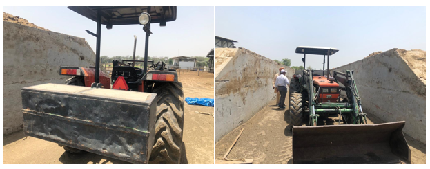 Compacting silage, 2 MT pressing weight behind heavy tractor for better compaction.